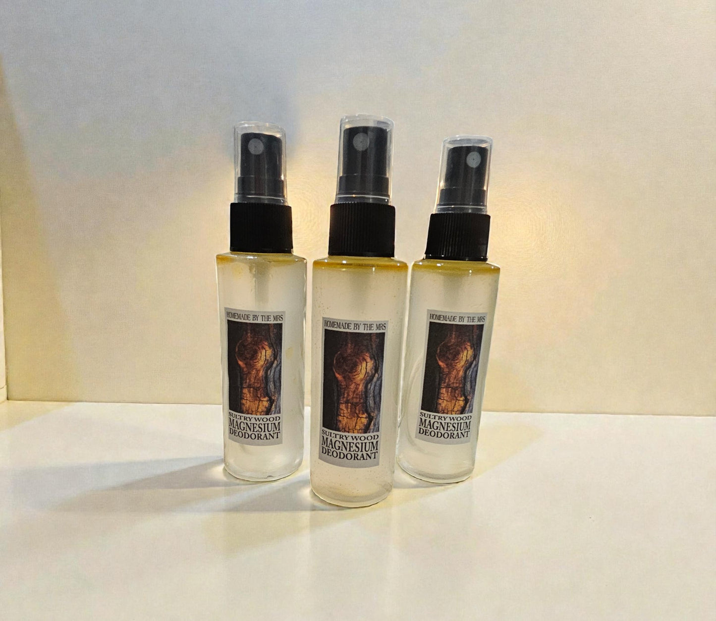 Deodorant Aloe and Magnesium Spray (Sultry Wood) 2oz clear misting spray bottle